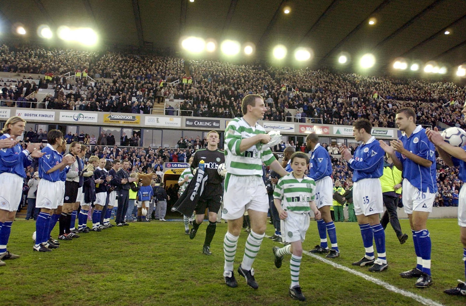Tom Boyd leads out Celtic 