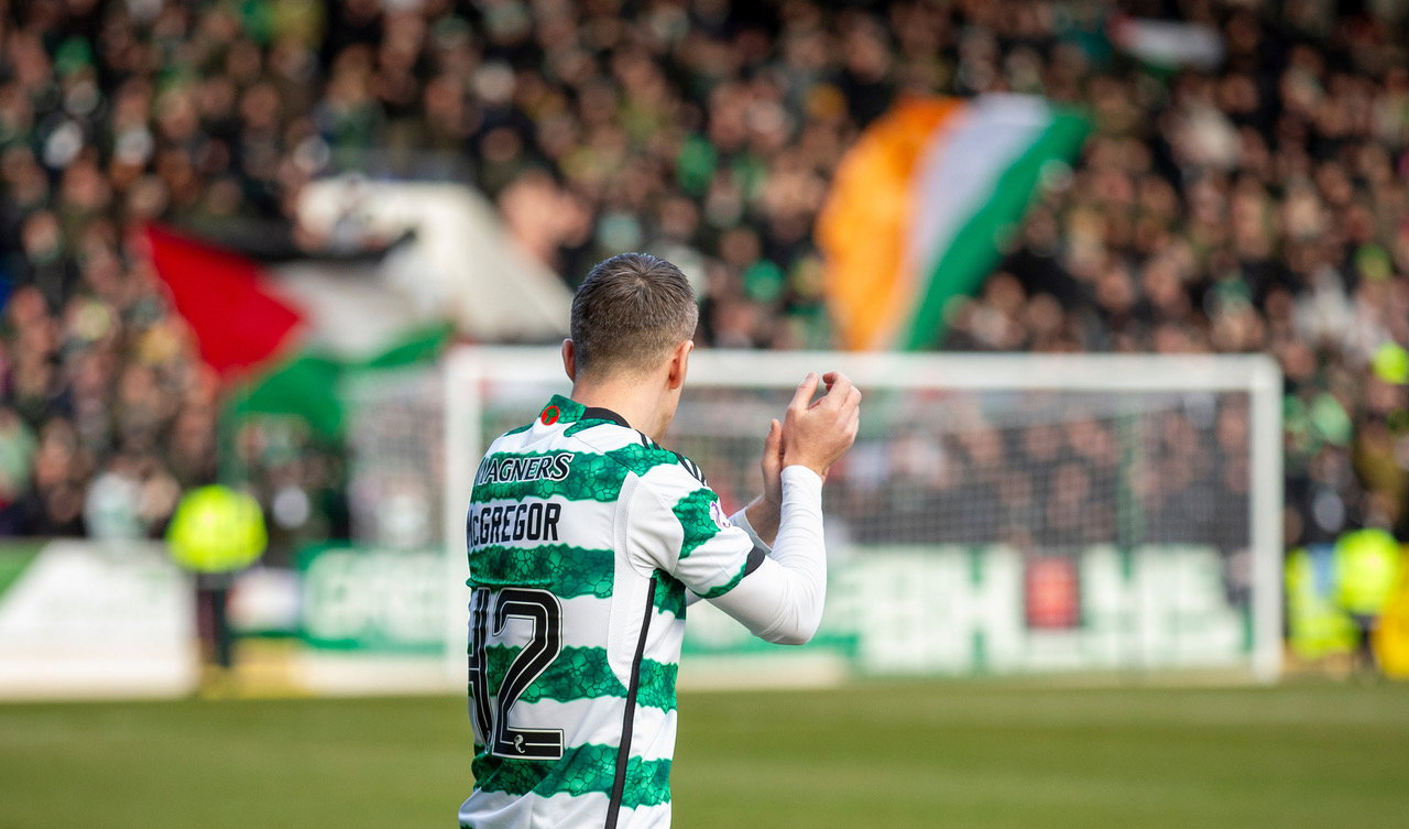 Callum McGregor applauds the Celtic supporters at McDiarmid Park