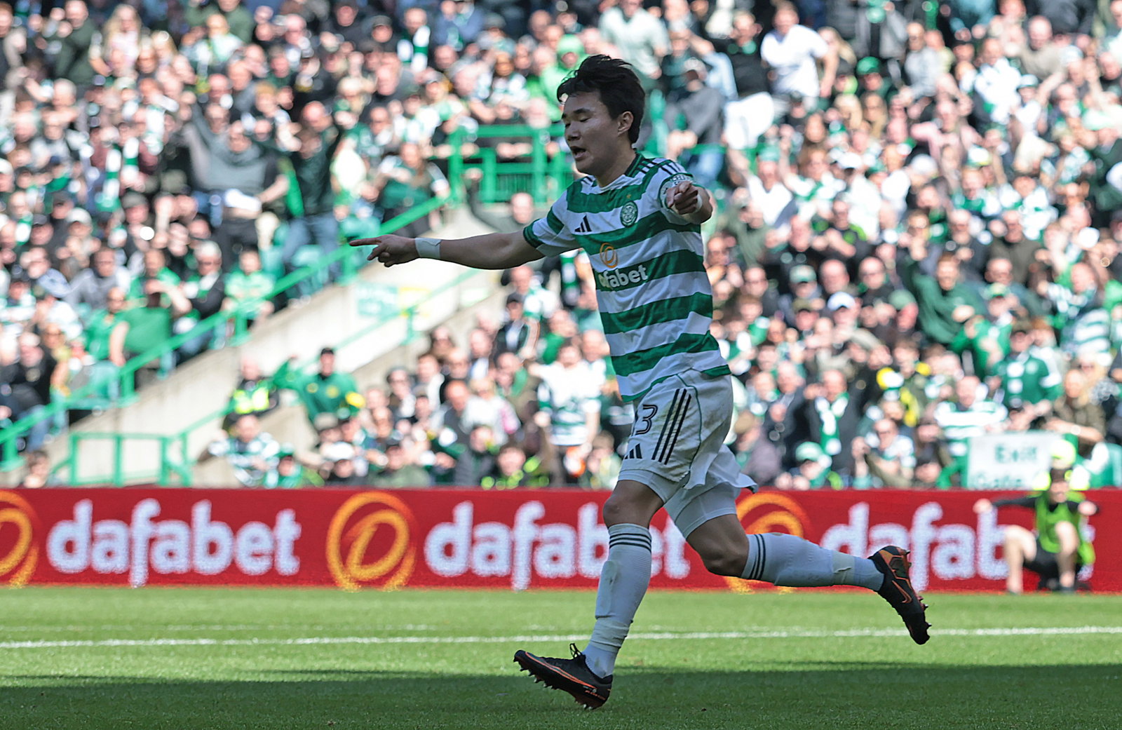 Hyunjun Yang of Celtic celebrates