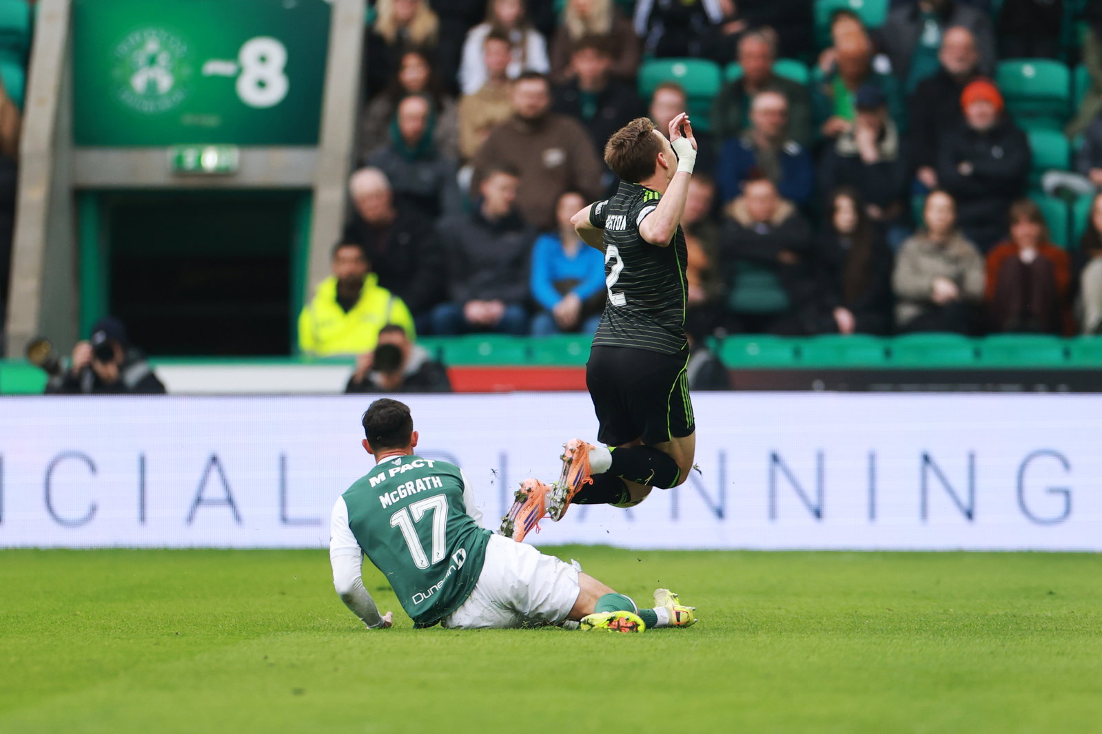  Jamie McGrath of Hibernian fouls Alistair Johnston
